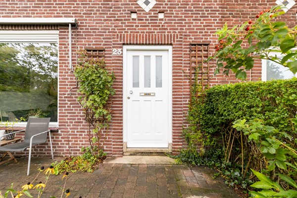 Foto - Te koop: Sfeervolle tussenwoning met groene oase!